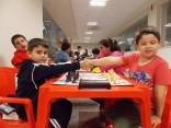 Arthur Zarabia de Santana (D), de 6 anos, foi o mais jovem enxadrista da competição - Fotografo: Divulgação - Data: 28/09/2015