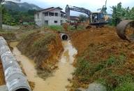 Drenagem na Vila Piske em Pirabeiraba - Fotografo: Divulgação/SECOM - Data: 04/04/2014